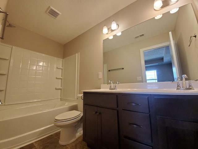 full bathroom featuring toilet, tile patterned floors, vanity, and shower / bathing tub combination