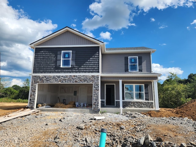 view of front of property featuring a garage