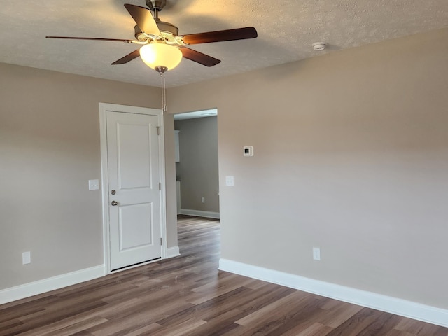 unfurnished room featuring a textured ceiling, ceiling fan, and hardwood / wood-style floors