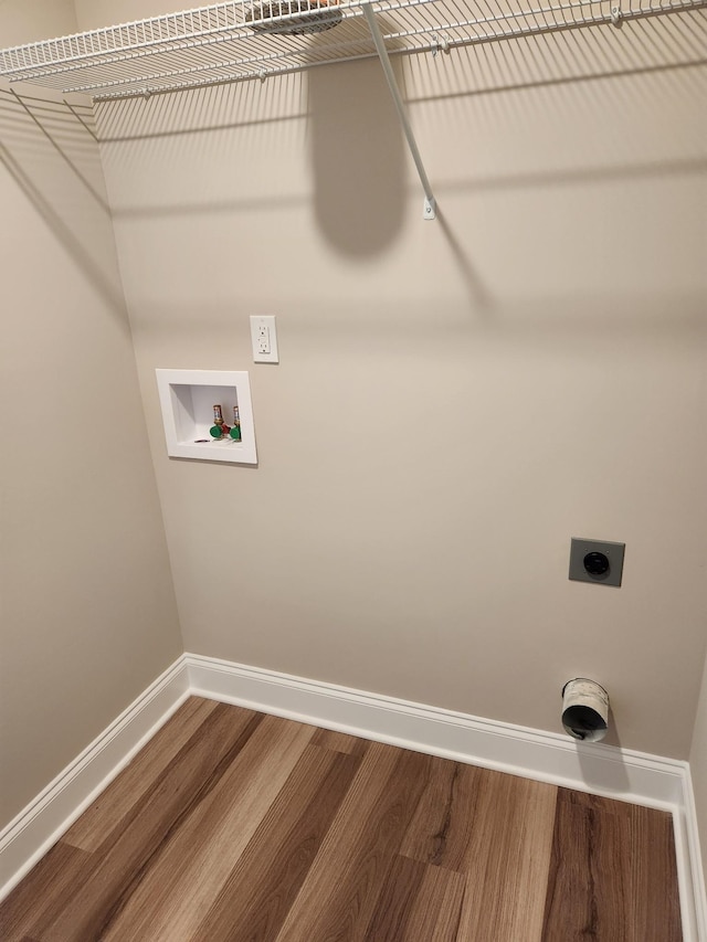 laundry room featuring hardwood / wood-style flooring, hookup for a washing machine, and hookup for an electric dryer