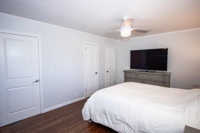 bedroom featuring ceiling fan, dark hardwood / wood-style flooring, and ornamental molding