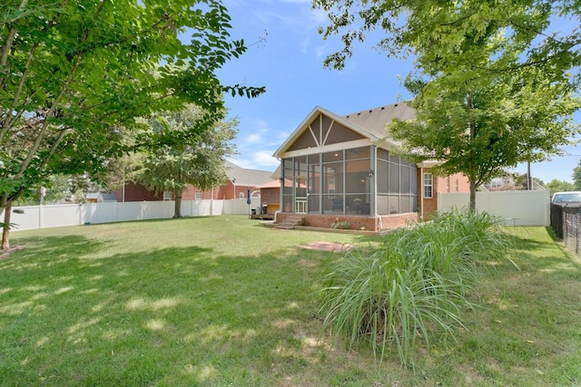 view of yard with a sunroom