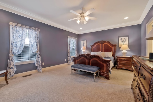 bedroom with ceiling fan, light colored carpet, and crown molding