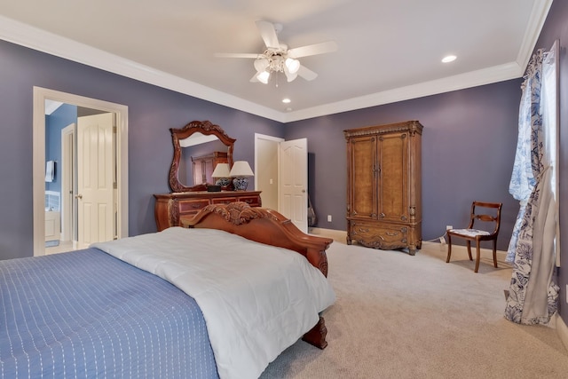 carpeted bedroom featuring ceiling fan, crown molding, and ensuite bath