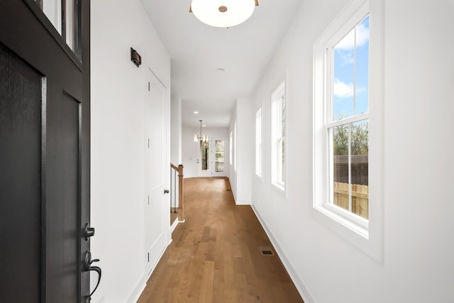 hall featuring hardwood / wood-style floors