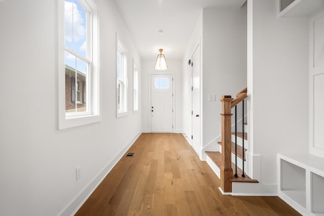 doorway to outside featuring light hardwood / wood-style flooring