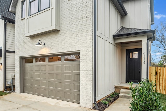 entrance to property featuring a garage