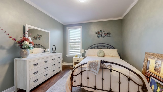 bedroom with crown molding and dark hardwood / wood-style floors