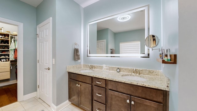 bathroom with vanity and tile patterned floors