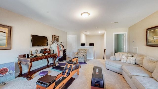 living room featuring light colored carpet