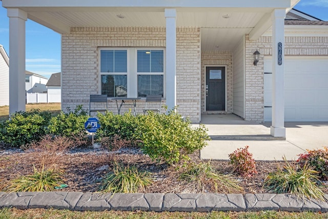 entrance to property with a porch