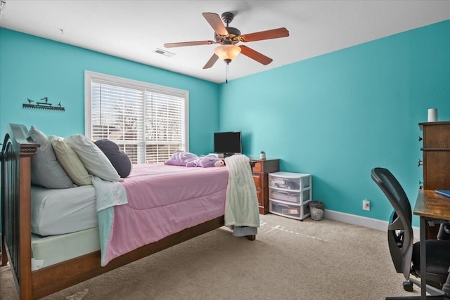 bedroom featuring ceiling fan and carpet floors