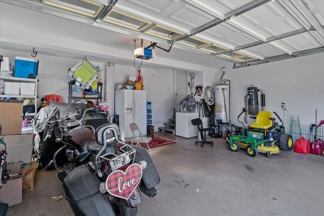 garage with a garage door opener and gas water heater