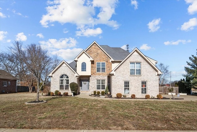 view of front of home with a front lawn