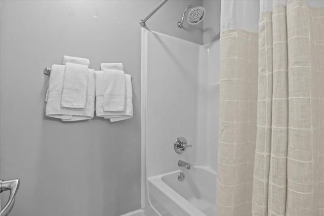 bathroom featuring shower / bathtub combination with curtain