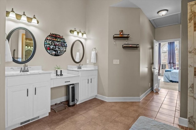 bathroom with vanity and tile patterned floors