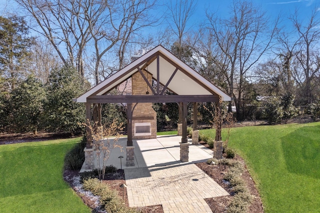 exterior space featuring an outdoor stone fireplace