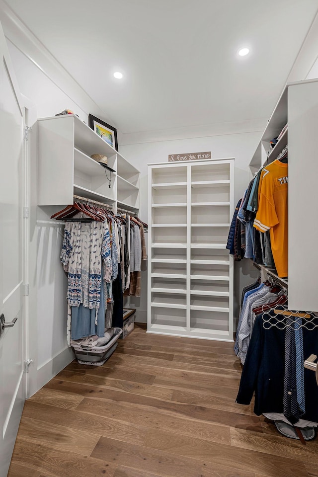 walk in closet featuring hardwood / wood-style floors