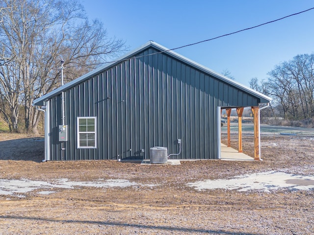 view of outdoor structure featuring central AC