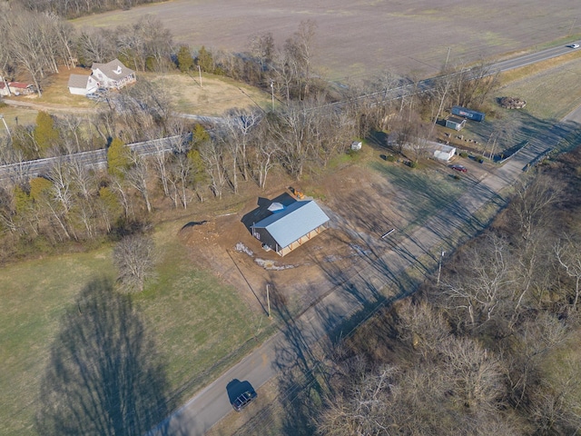 birds eye view of property featuring a rural view