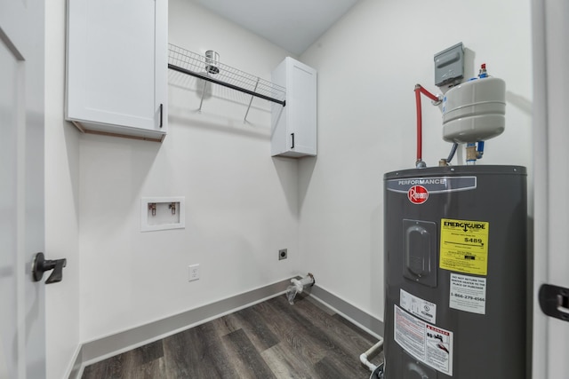 laundry area with hookup for a washing machine, water heater, dark wood-type flooring, electric dryer hookup, and cabinets