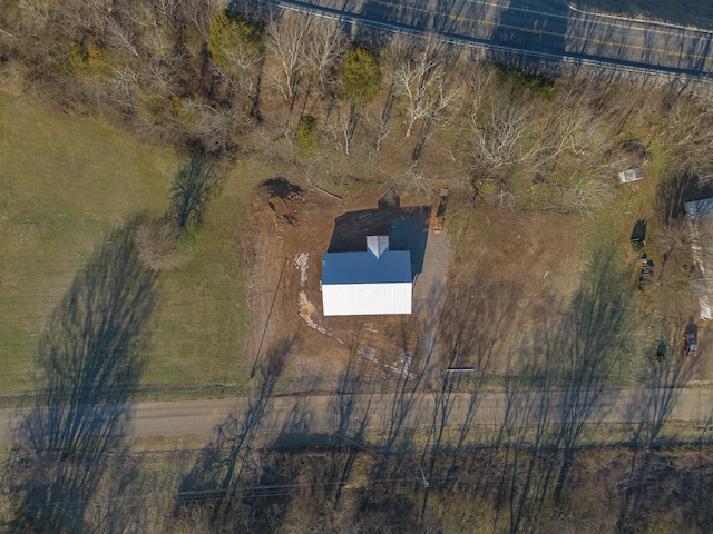 birds eye view of property with a rural view