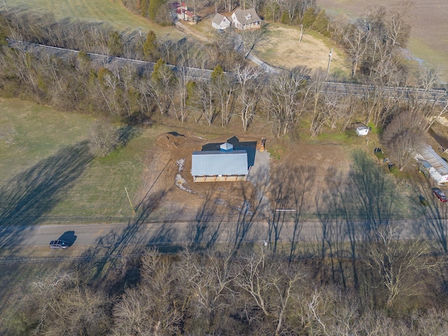 birds eye view of property featuring a rural view