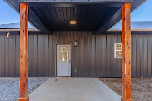 property entrance with a patio