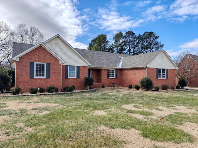 ranch-style home with a front yard