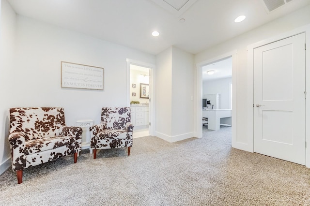 sitting room with carpet