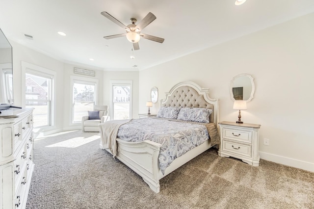 carpeted bedroom featuring ceiling fan