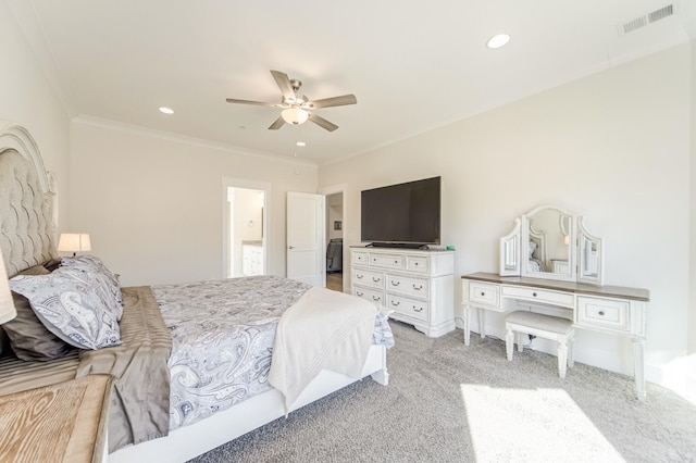 carpeted bedroom featuring ceiling fan and ornamental molding