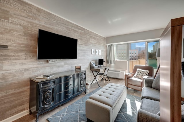 living room with wooden walls