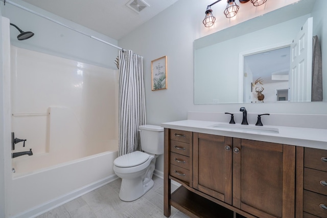 full bathroom featuring toilet, shower / bathtub combination with curtain, and vanity