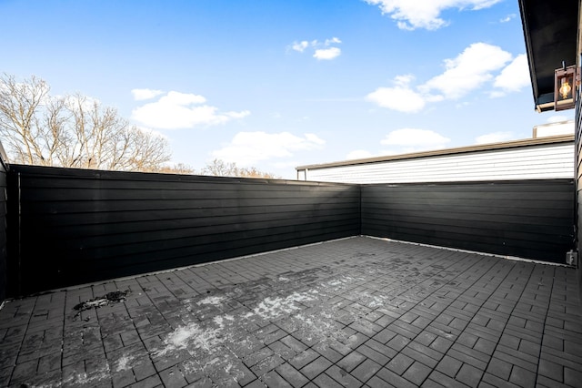 view of patio with a carport