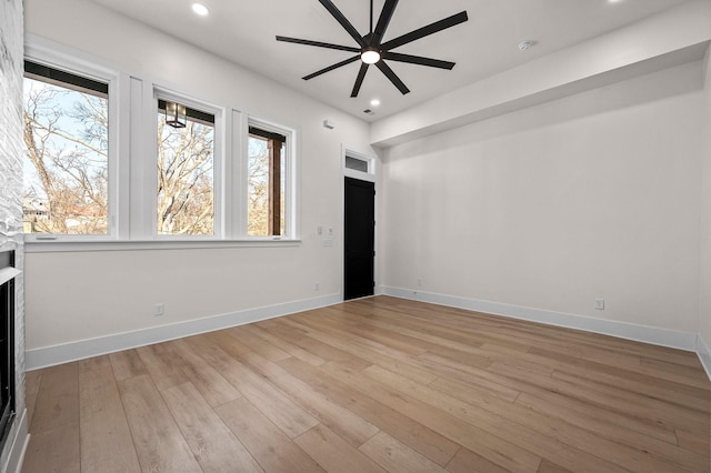 interior space featuring ceiling fan and light hardwood / wood-style flooring