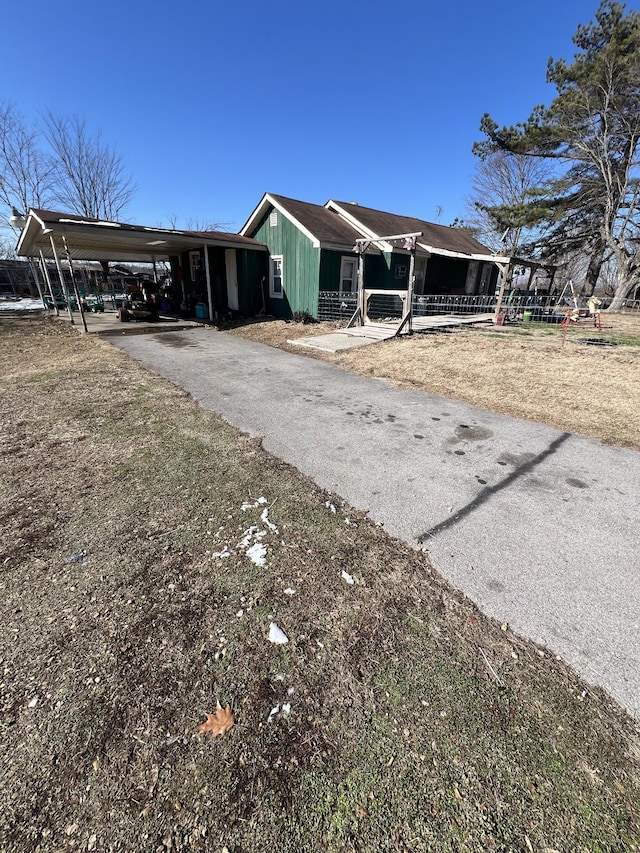 view of front of house with a carport