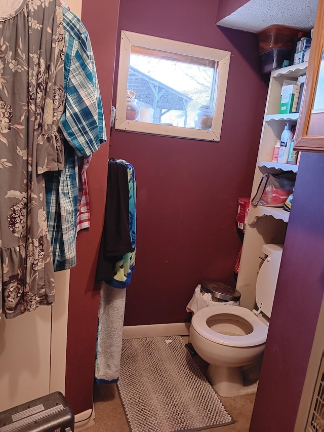 bathroom featuring toilet