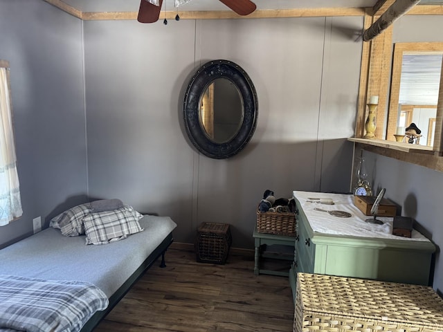 bedroom with dark wood-type flooring and ceiling fan