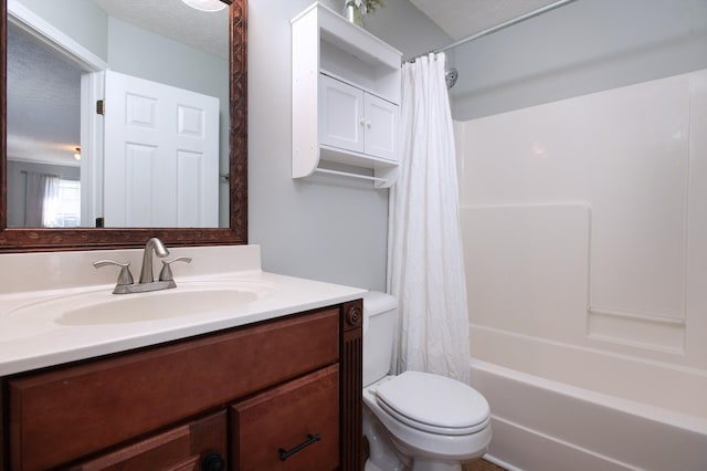 full bathroom featuring a textured ceiling, toilet, vanity, and shower / tub combo with curtain