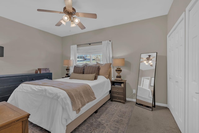 bedroom with a closet, carpet floors, and ceiling fan