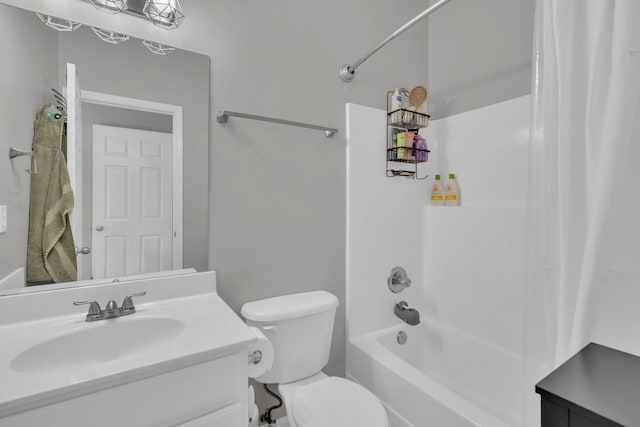 full bathroom with bathtub / shower combination, toilet, and vanity