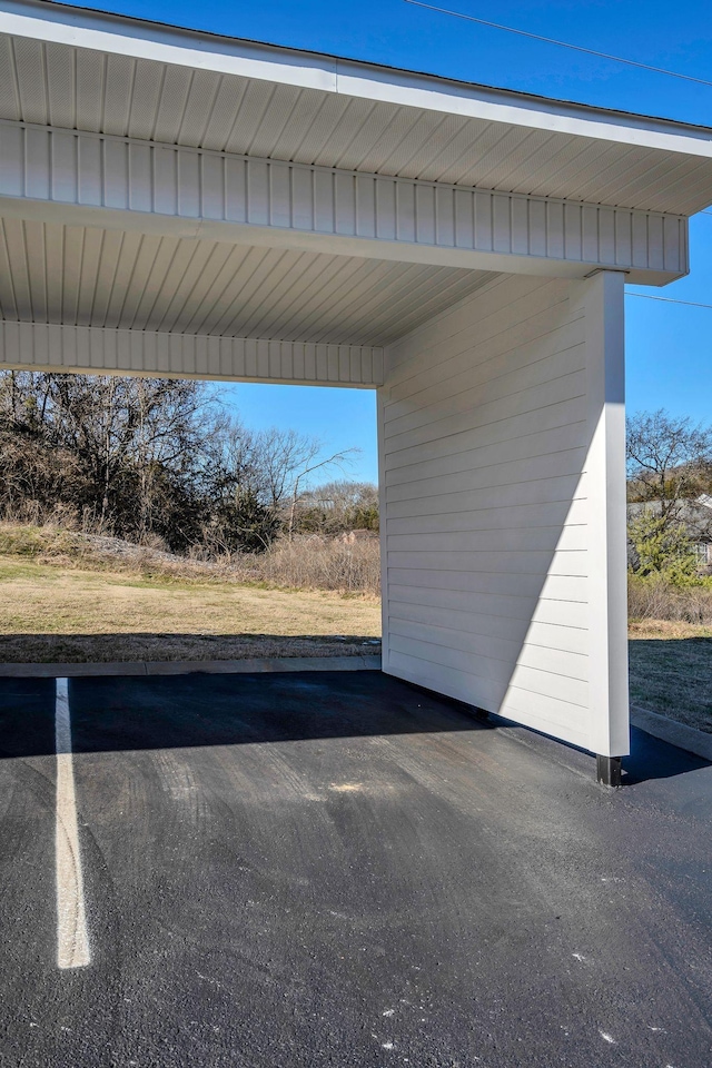 view of car parking featuring a carport