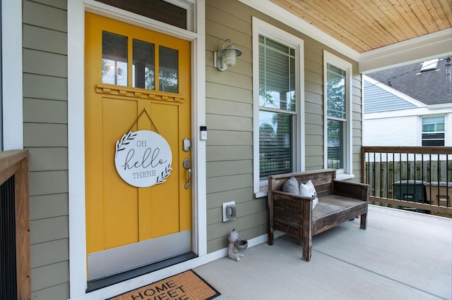 doorway to property featuring a porch