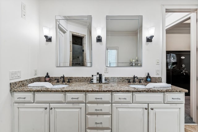 bathroom featuring vanity and crown molding