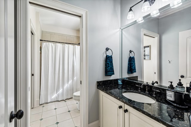 bathroom with curtained shower, toilet, vanity, and tile patterned flooring