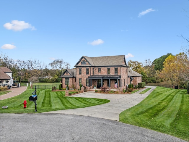 view of front of home featuring a front yard