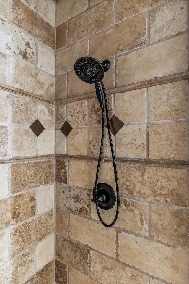 details with a tile shower