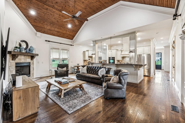 living room with high vaulted ceiling, plenty of natural light, wood ceiling, and a fireplace