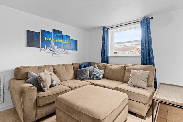 living room with light tile patterned floors